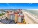 Exterior view of the condo building near the beach, showcasing the balcony and beach view at 18304 Gulf Blvd # 217, Redington Shores, FL 33708