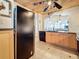 Kitchen features stainless steel appliances, tile floor, and connection to living space at 18304 Gulf Blvd # 217, Redington Shores, FL 33708