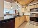 Well-equipped kitchen with stainless steel appliances, granite countertops, and ample cabinet space at 18304 Gulf Blvd # 217, Redington Shores, FL 33708