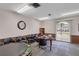 Game room with card tables and wainscoting offering a comfortable space for board games and social gatherings at 19029 Us Highway 19 N # 8-15, Clearwater, FL 33764
