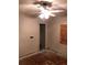 Bedroom with fan and boarded window at 3201 N 15Th St, Tampa, FL 33605