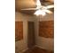 Bedroom with fan and boarded windows at 3201 N 15Th St, Tampa, FL 33605