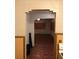 Entryway featuring wood-look floors and access to an adjacent bedroom at 3201 N 15Th St, Tampa, FL 33605
