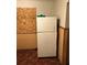 Kitchen featuring a white refrigerator with white and yellow tile trim at 3201 N 15Th St, Tampa, FL 33605