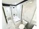 Bathroom featuring glass shower with subway tile and black accents at 3735 69Th N Way, St Petersburg, FL 33710