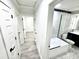 Bathroom featuring glass shower with subway tile and modern bathtub at 3735 69Th N Way, St Petersburg, FL 33710