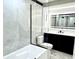 Bathroom featuring a modern bathtub and a glass shower with subway tile at 3735 69Th N Way, St Petersburg, FL 33710