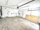 Unfinished garage with white walls and a cement floor at 3735 69Th N Way, St Petersburg, FL 33710