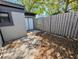 Enclosed private back patio with view of the fence line at 375 Woods Landing Trl, Oldsmar, FL 34677