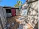 Enclosed private back patio area with sliding door and storage shed at 375 Woods Landing Trl, Oldsmar, FL 34677