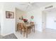 Charming dining area with seating for four and neutral decor for casual meals and entertaining in this Florida condo at 4900 Brittany S Dr # 304, St Petersburg, FL 33715