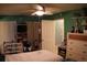 A spacious bedroom includes a bed, ceiling fan, and large closets for ample storage at 6000 20Th N St # 141, St Petersburg, FL 33714