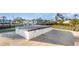 Backyard featuring an enclosed hot tub with a view of the canal at 607 Manatee Ave, Ellenton, FL 34222