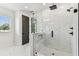 Bathroom featuring a glass shower and modern fixtures with marble tile flooring at 713 W West St, Tampa, FL 33603
