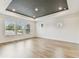 Bright bedroom with modern wood floors and large windows that provide ample natural light at 713 W West St, Tampa, FL 33603