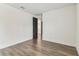 This bedroom features stylish wood floors and a neutral color palette at 713 W West St, Tampa, FL 33603