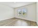 This bedroom features a large window that provides lots of natural light at 713 W West St, Tampa, FL 33603