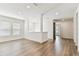 Bright, open upstairs area with hardwood floors and a view of the downstairs at 713 W West St, Tampa, FL 33603