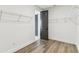 Spacious walk-in closet with laminate floors and wire shelving at 713 W West St, Tampa, FL 33603