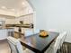 Dining area adjacent to the kitchen, perfect for Gathering meals and entertaining guests at 8264 Dunham Station Dr, Tampa, FL 33647