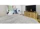 Main bedroom offers neutral tones, and archways to other rooms, offering a bright and airy feel at 8264 Dunham Station Dr, Tampa, FL 33647