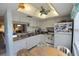 Comfortable kitchen with updated cabinets, appliances, and a sunny breakfast nook at 960 Virginia St # 205, Dunedin, FL 34698