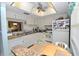 Cozy kitchen with updated cabinets, appliances, and a sunny breakfast nook at 960 Virginia St # 205, Dunedin, FL 34698