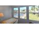 Inviting dining area with scenic views of the tranquil pond, showcasing the natural beauty surrounding the home at 960 Virginia St # 205, Dunedin, FL 34698