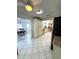 View of open kitchen featuring stainless steel appliances and tiled floors at 10063 40Th N St # 3, Pinellas Park, FL 33782