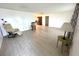 Bright living room with tile floors, comfortable seating, and open layout at 10063 40Th N St # 3, Pinellas Park, FL 33782