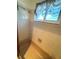 Corner view of a bathtub and tiled shower with a showerhead at 10063 40Th N St # 3, Pinellas Park, FL 33782