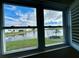 Window with a view of a canal and waterfront neighborhood at 10063 40Th N St # 3, Pinellas Park, FL 33782