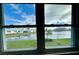 Water view from window featuring canal and neighborhood scenery at 10063 40Th N St # 3, Pinellas Park, FL 33782
