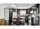 Well-designed kitchen with center island, stainless steel appliances, and dark cabinetry at 1011 W Charter St, Tampa, FL 33602
