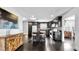 Modern kitchen boasts dark cabinetry, a center island with stools, and stainless steel appliances at 1011 W Charter St, Tampa, FL 33602