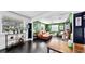 Bright living room featuring large windows, stylish furnishings, and inviting decor at 1011 W Charter St, Tampa, FL 33602