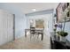 Charming dining area with bay windows, creating a cozy and inviting space for meals at 11054 Liberto Rd, Weeki Wachee, FL 34614