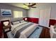 Stylish bedroom featuring modern decor, a comfortable bed, and an inviting ambiance for restful nights at 12139 Buffington Ln, Riverview, FL 33579