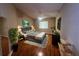 Serene main bedroom with a hardwood floor, ample natural light, and a soothing color palette for relaxation at 12139 Buffington Ln, Riverview, FL 33579