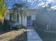 Inviting single-story home with mature landscaping and a welcoming front entrance at 12139 Buffington Ln, Riverview, FL 33579