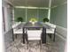 Inviting patio with stylish seating, perfect for outdoor dining and entertaining in a serene environment at 12139 Buffington Ln, Riverview, FL 33579