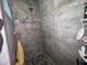 Modern shower with tile surround, multiple showerheads, and stylish fixtures at 12139 Buffington Ln, Riverview, FL 33579