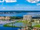 Expansive aerial view of condo community overlooking serene waterfronts and lush landscapes at 130 Riviera Dunes Way # 606, Palmetto, FL 34221