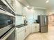 Well-equipped kitchen with stainless steel appliances, modern fixtures, and plenty of cabinet space at 130 Riviera Dunes Way # 606, Palmetto, FL 34221