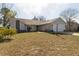 Inviting single-Gathering home with a well-maintained lawn and a convenient two-car garage, bathed in natural light at 13305 Whitby Rd, Hudson, FL 34667