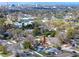 An aerial view of a charming home nestled in a lush neighborhood near downtown, offering a serene residential experience at 1579 Magnolia Dr, Clearwater, FL 33756