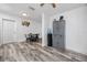 Functional dining area with built-in storage, a round table, and a ceiling fan at 1579 Magnolia Dr, Clearwater, FL 33756