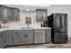 Beautiful gray kitchen features stainless steel appliances and plenty of cabinet space at 1579 Magnolia Dr, Clearwater, FL 33756
