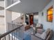 Cozy balcony featuring comfortable wicker furniture and ocean views at 1600 Gulf Blvd # 512, Clearwater, FL 33767
