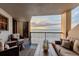 Relaxing balcony offers comfortable seating and stunning ocean views at sunset at 1600 Gulf Blvd # 512, Clearwater, FL 33767